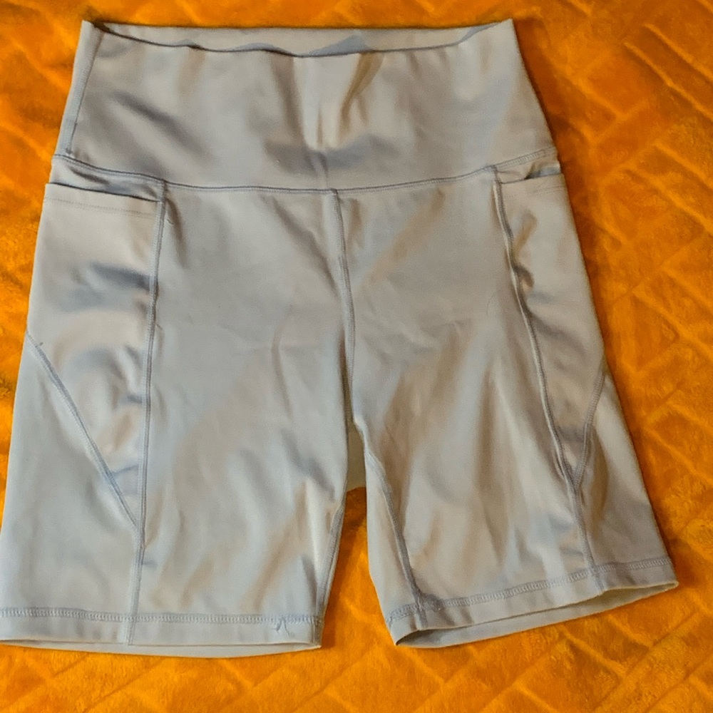 teal blue biker shorts, spandex material, size medium
